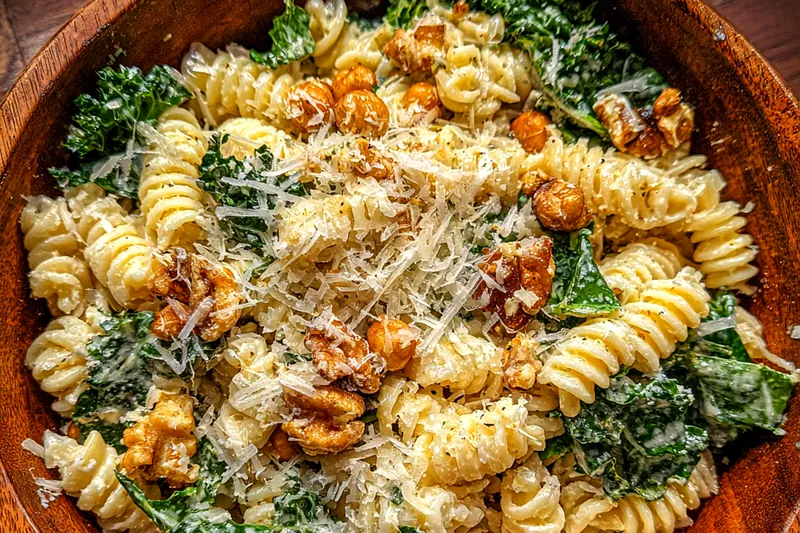 A step-by-step visual guide showing the cooking process for Creamy Pasta Caesar Delight.